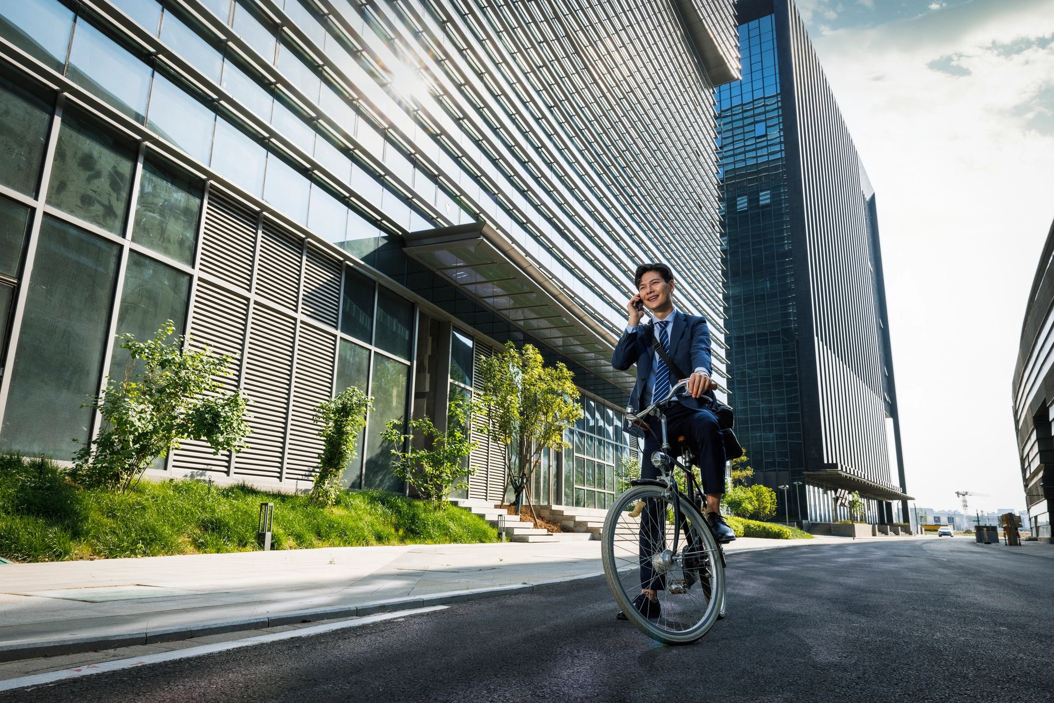 Delivery courier riding a bicycle through a city street